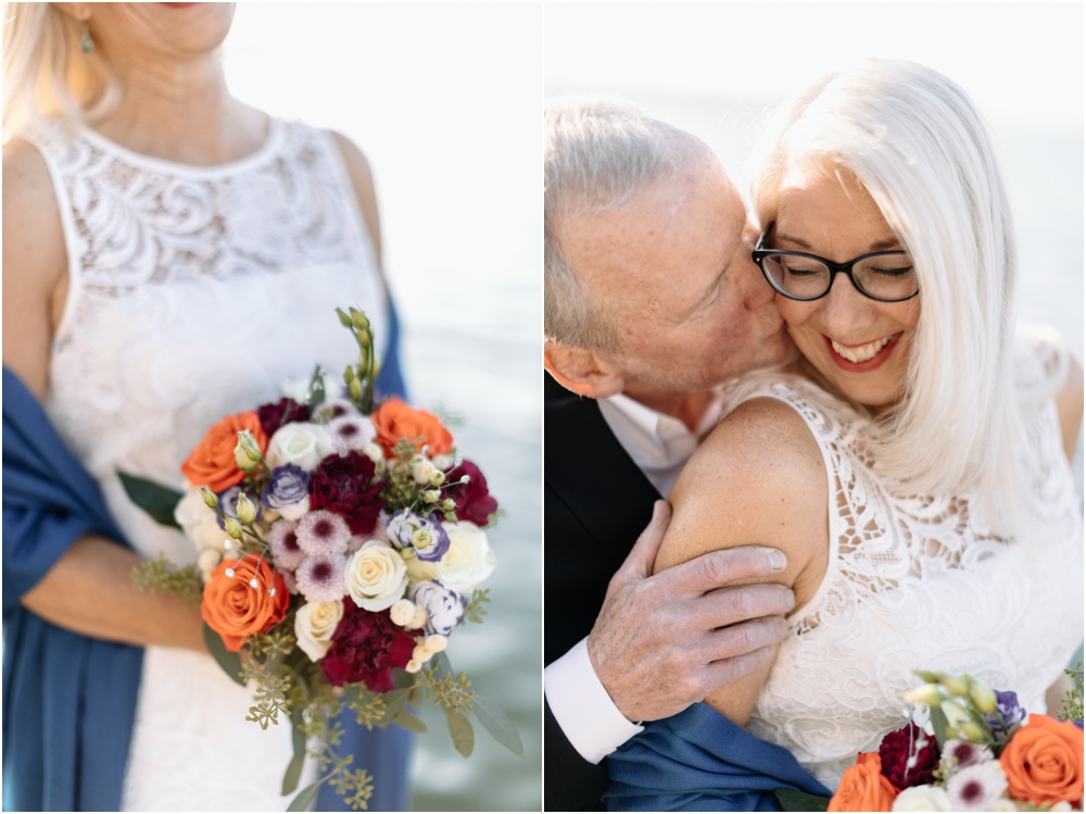 groom kisses bride Hyatt Regency Lake Washington