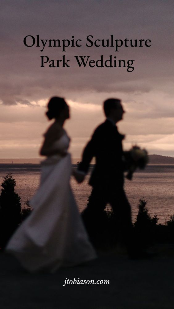 couple runs in the rain during olympic sculpture park wedding