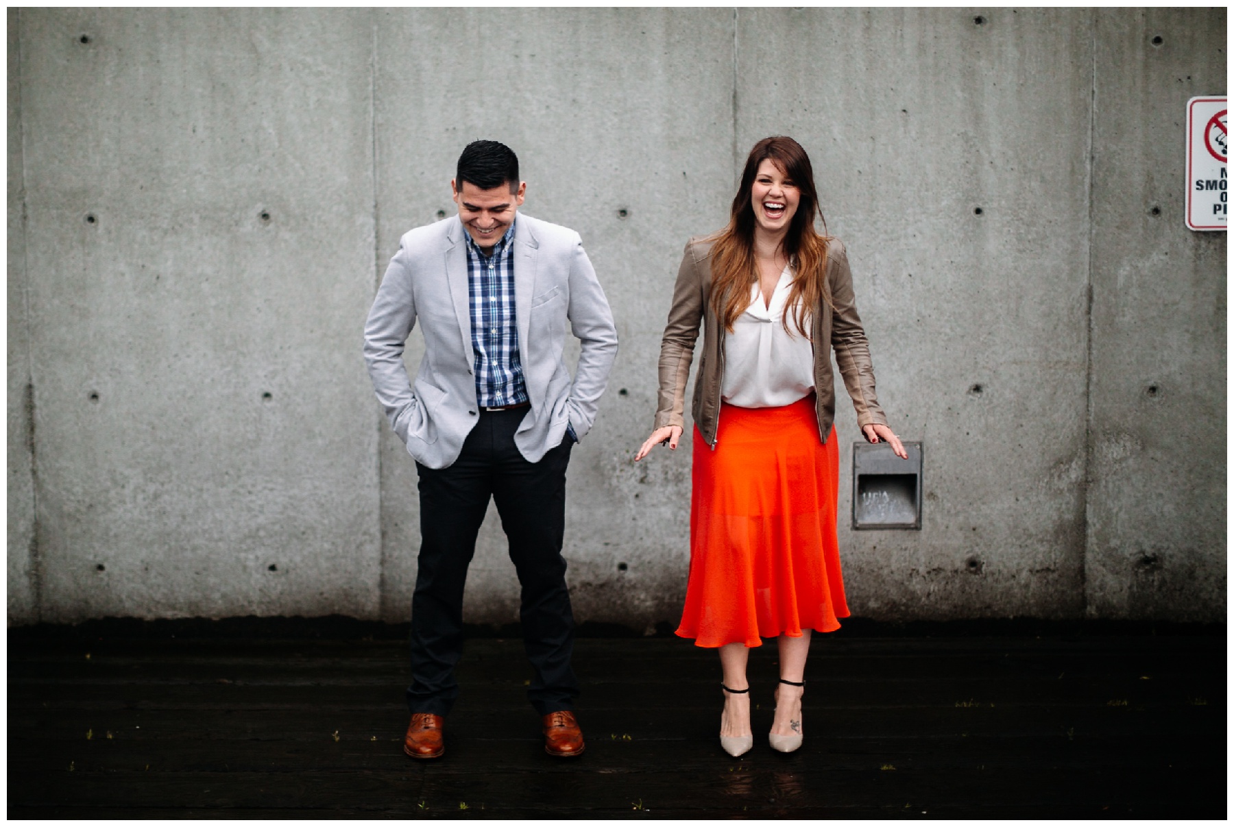 laughing couple seattle waterfront engagement