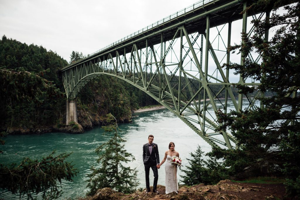 couple stands together deception pass engagement